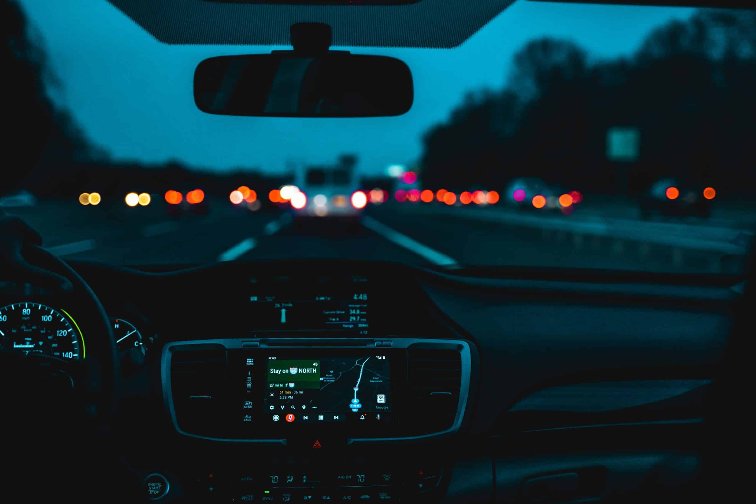 inside of car driving at night
