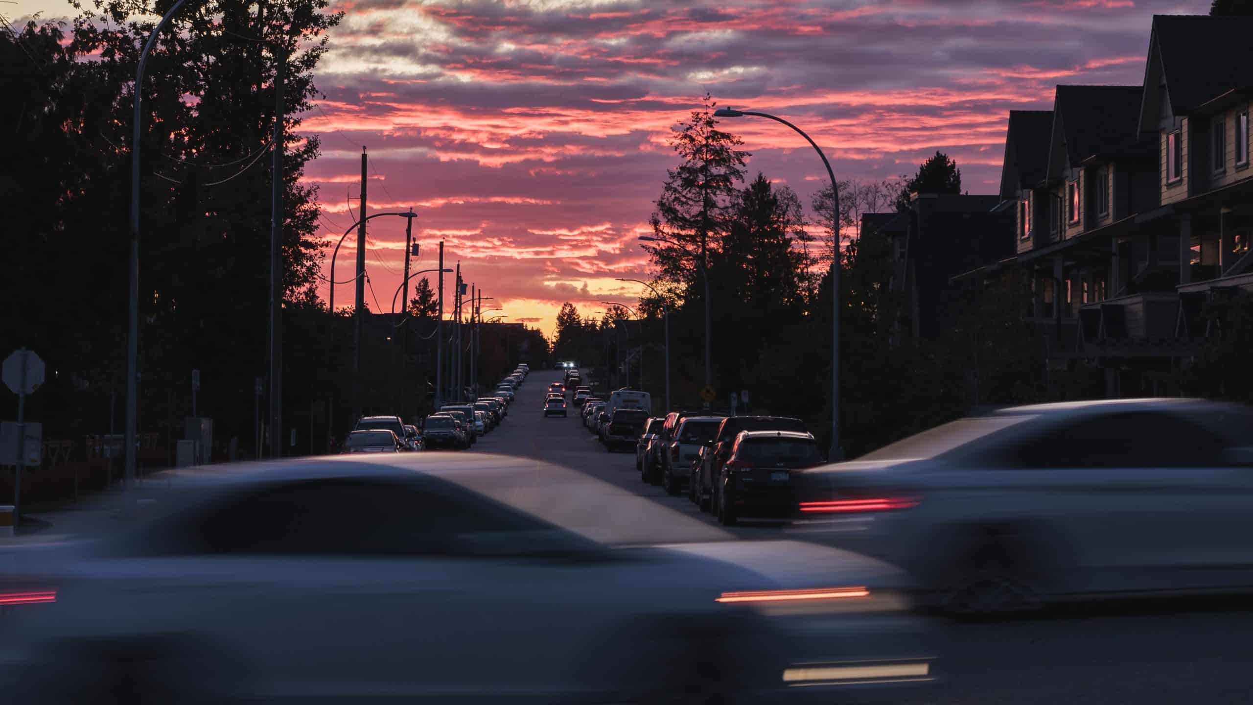 cars driving fast in the afternoon